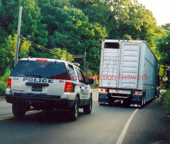 Whitemarsh Police Department pulls over double deck trailer owned by Three Hills Rodeo, Berard, IA